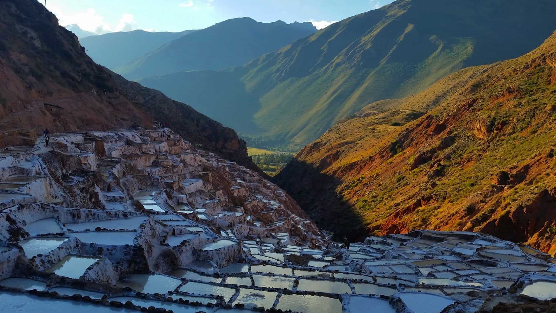 Over 3,000 evaporation salt pans clinging to the canyon wall in Maras, Sacred Valley