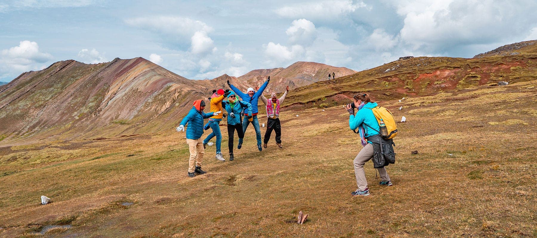 Three vibrant rainbow-colored mineral crests at Palcoyo mountain summit (4,900m / 16,076 ft), Canchis, Cusco, Peru
